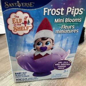 Santaverse Frost Pips Baby Elf in Purple Flower